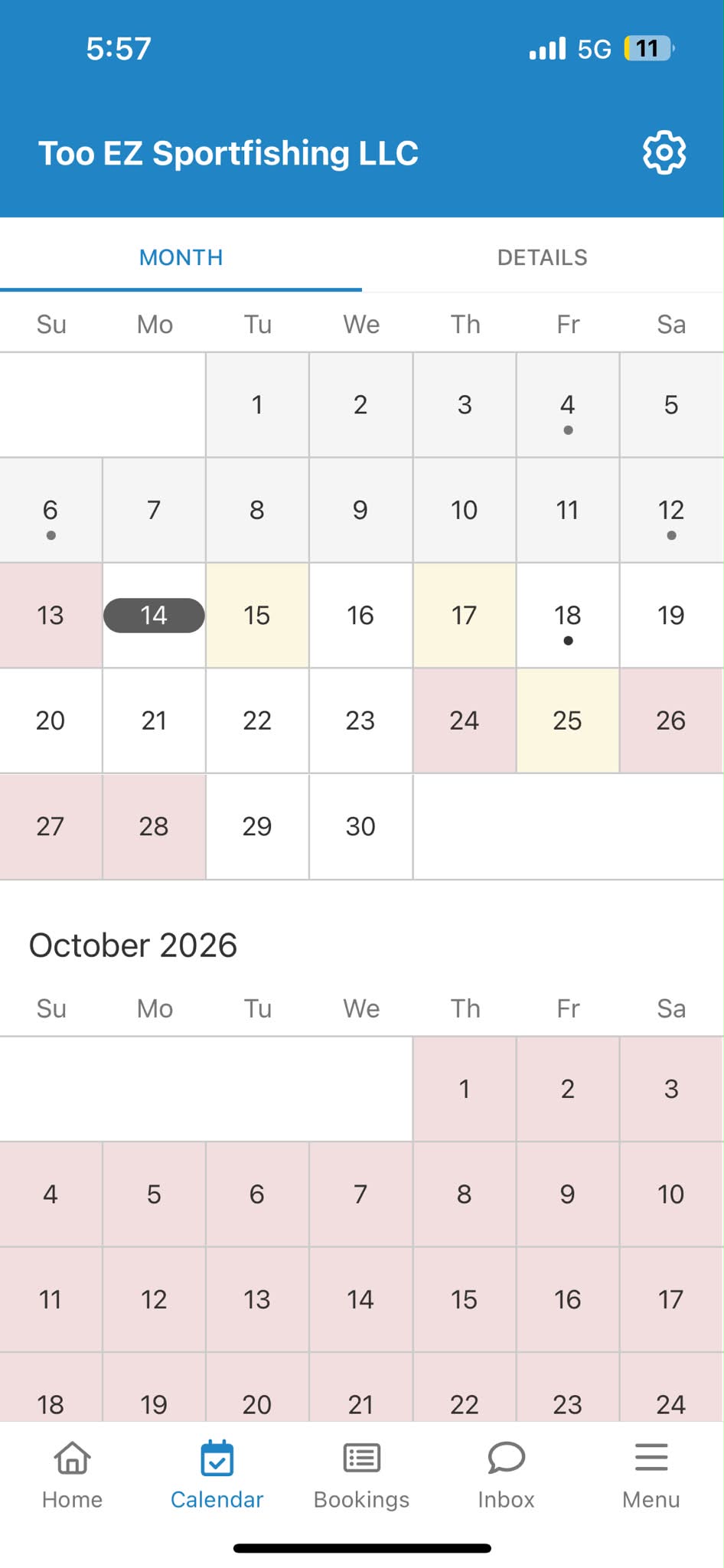 Too Ez Sportfishing LLC mobile app calendar interface showing September and October 2026 with various dates highlighted in pink and yellow, indicating availability or booking status.